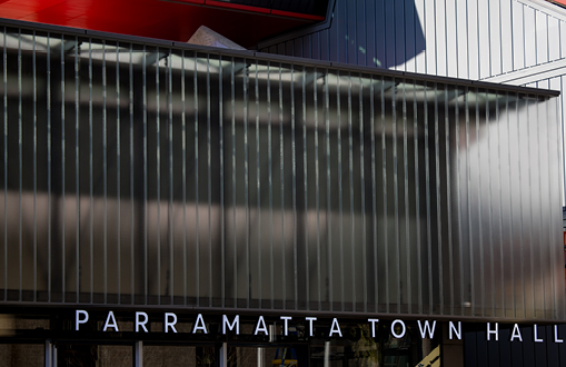 Image of modern exterior with the words Parramatta Town Hall on the transparent panels