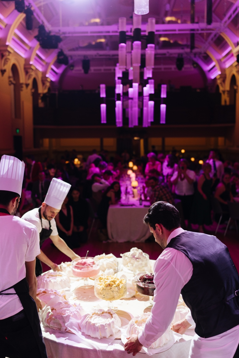 Caterers setting up food tables