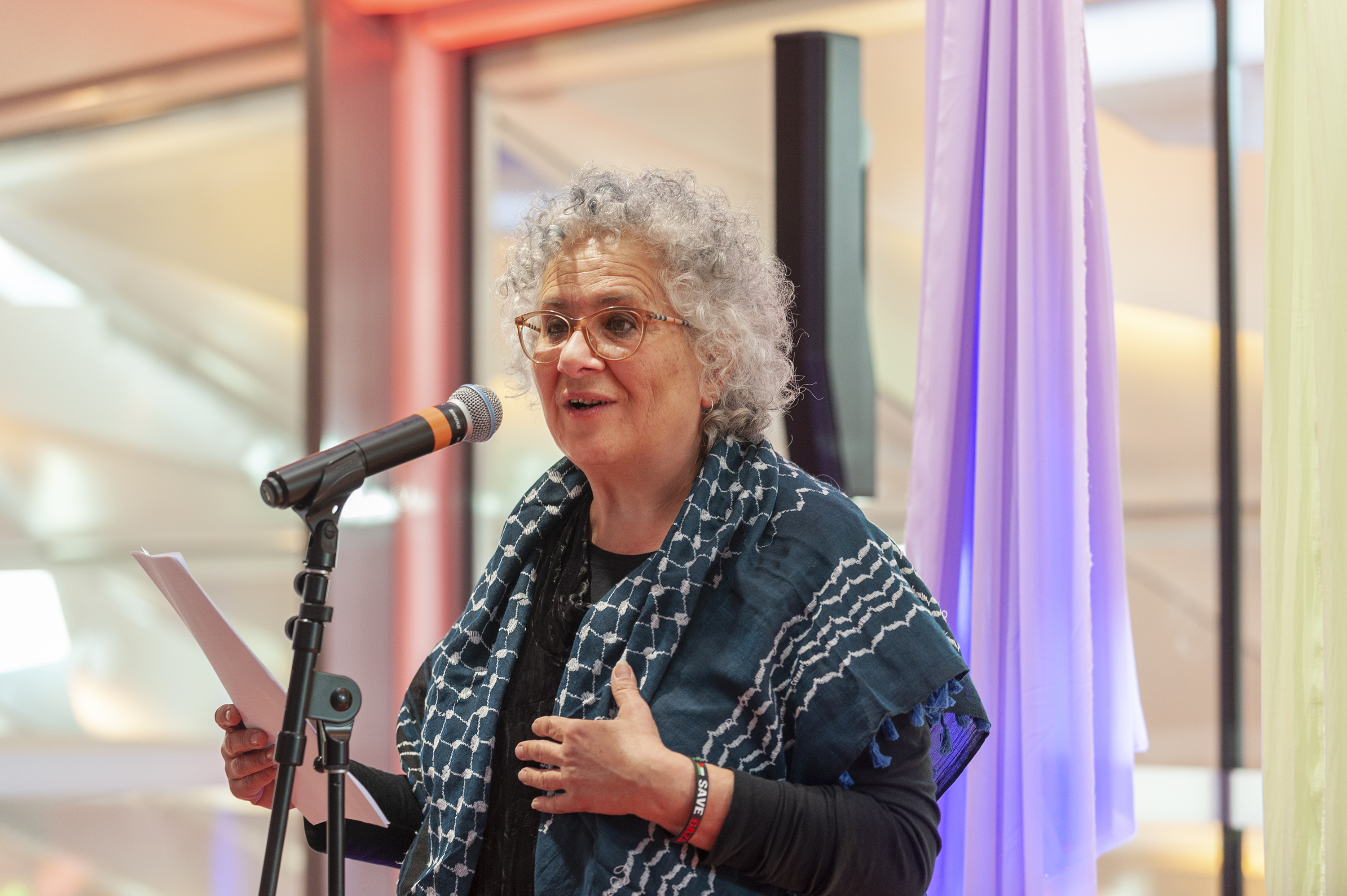 Lady Talking at Microphone