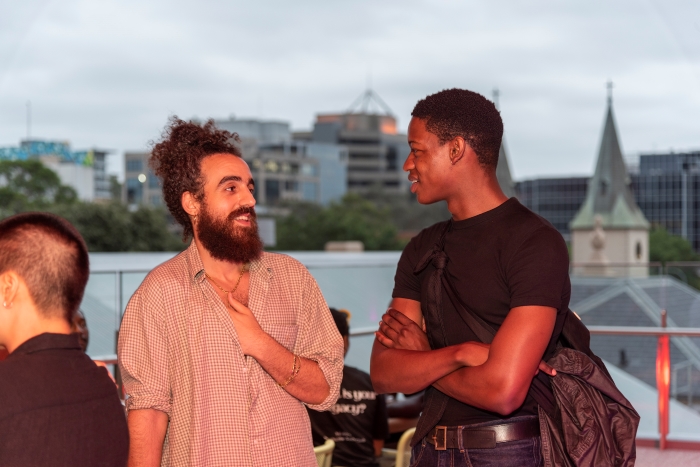 Two men talking on the Western Terrace