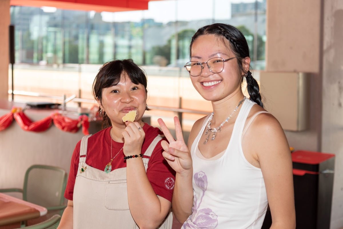 Two women smiling for a camera