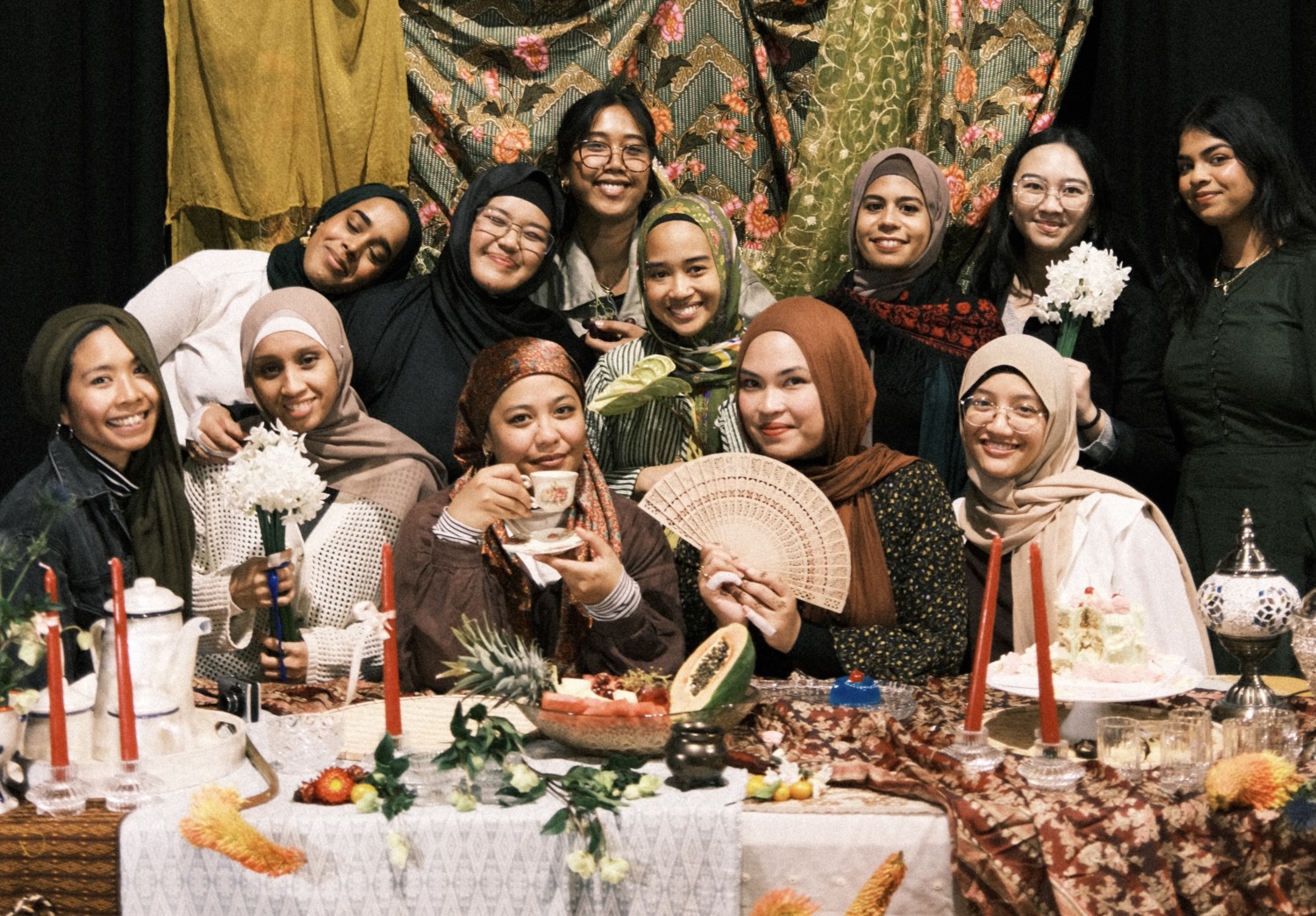 Group of women sitting at a table smiling