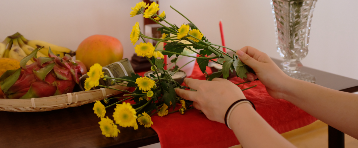 Hands holding flowers