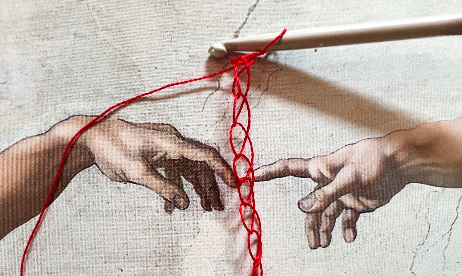 Artwork hands with crochet hook