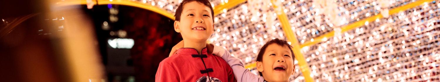 Two young boys in a light tunnel