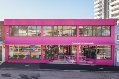 A large bright pink building